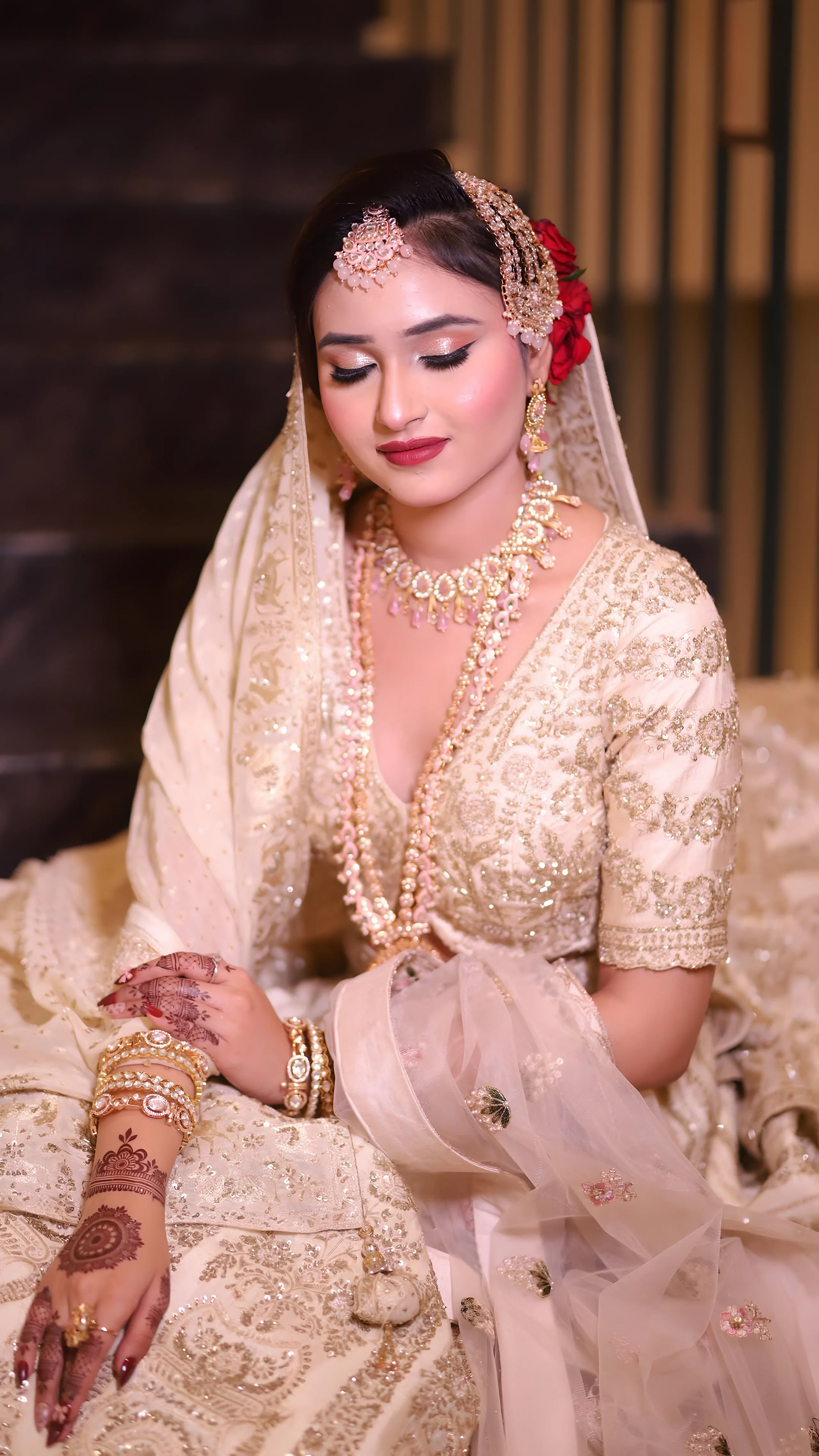 Bride in ivory and blush, makeup by PINK Makeover Studio