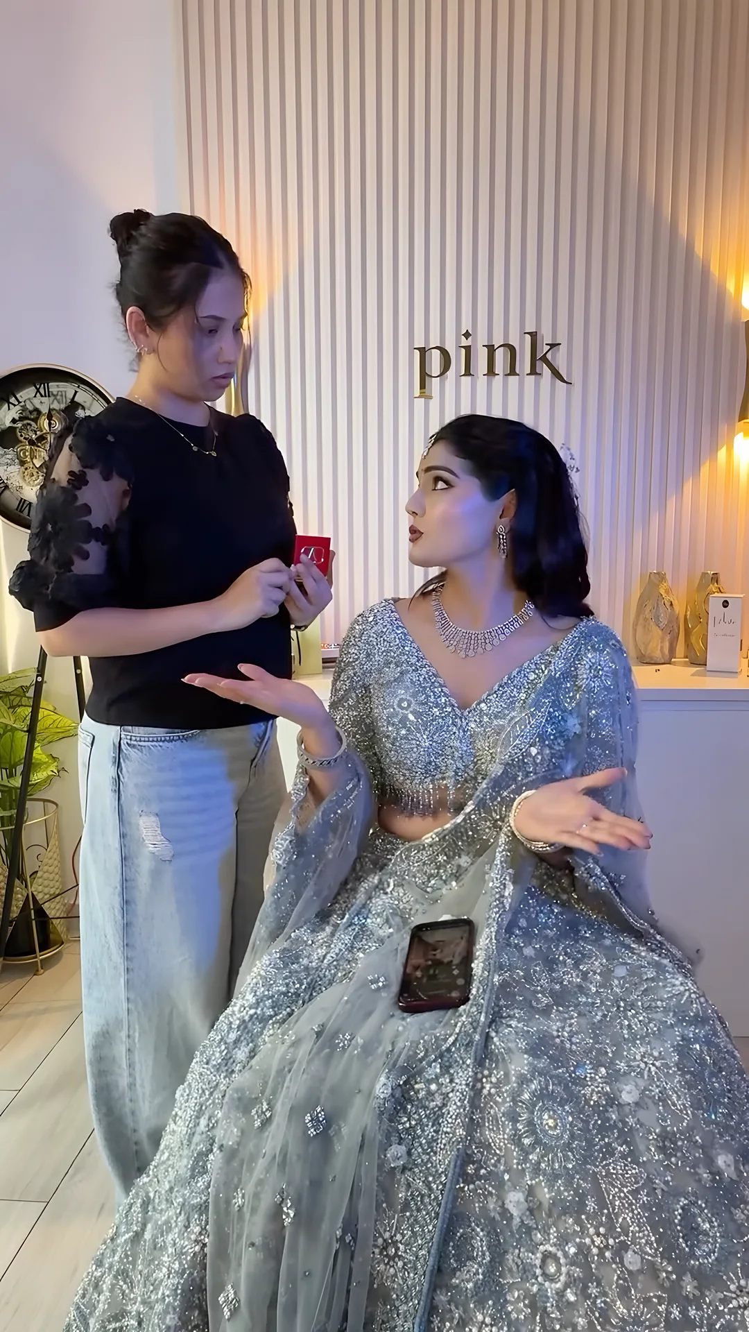 Firdaus with a client in the PINK studio